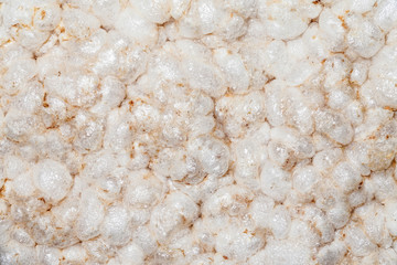 Puffed rice cake macro texture.