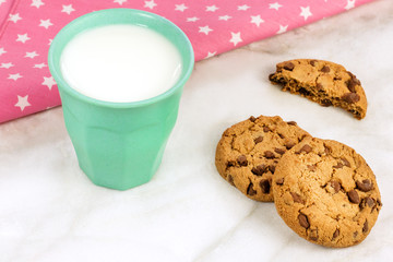 Chocolate chips cookies with milk and copyspace
