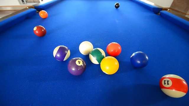 Playing billiard indoor