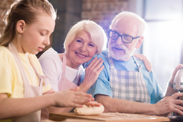 Family kneading dough