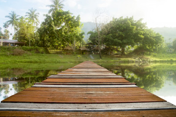 Obraz premium Wooden Walkway over the canal