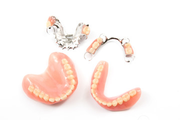 removable partial denture on white background.