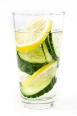 Detox water with cucumber and lemon isolated on white background
