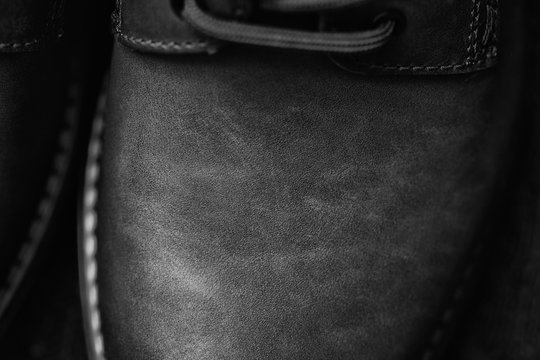 Background of the texture of the leather. Shoes closeup