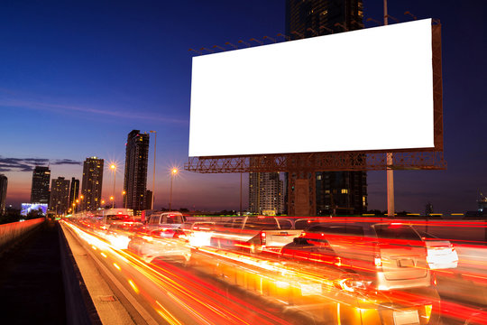 advertisement of blank billboard in the night traffic jam