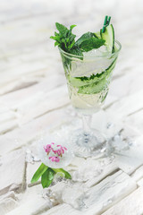 garnished cocktail on white background