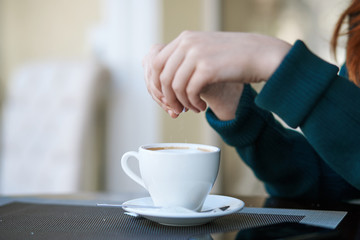 pour sugar into instant coffee