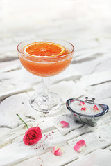 garnished cocktail on white background