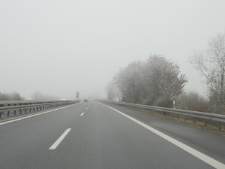 Fototapeta premium Highway in fog German Autobahn