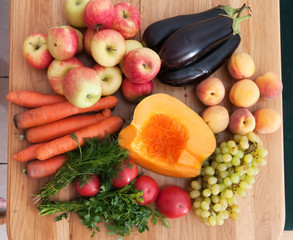 Fruit and vegetables on wooden table