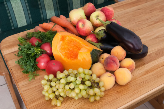 Fruit and vegetables on wooden table