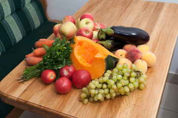 Fruit and vegetables on wooden table