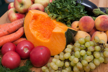 Fruit and vegetables on wooden table