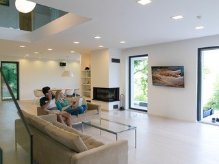 young happy couple relaxes in the living room