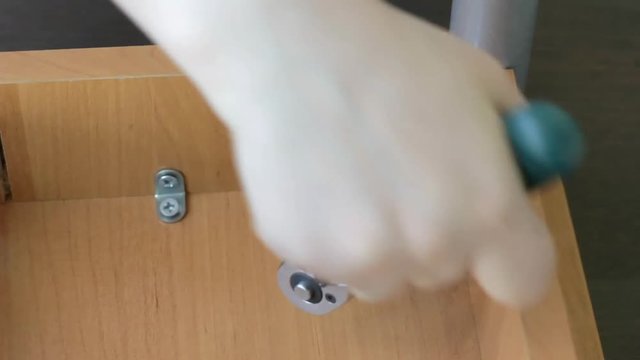 Furniture assembly with socket wrench