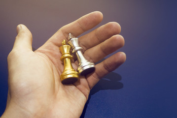 hand hold two king chess and business war