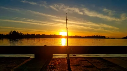 Fotobehang evening sunset fishing rod © stmax113