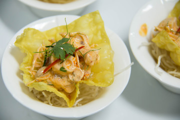 spicy seafood salad in white cup