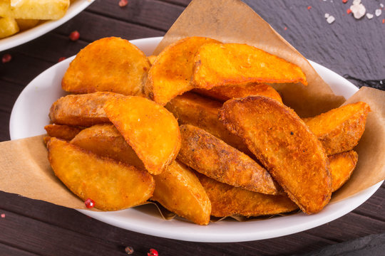 Potatoes in a rural, deep fried, are served as a separate dish or as a garnish for meat