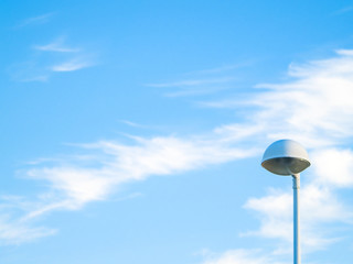 Street lights on a cloudy day on and urban landscape