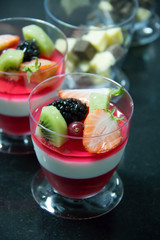  fruit jelly ontop wild strawberries, blackberries kiwi  slice