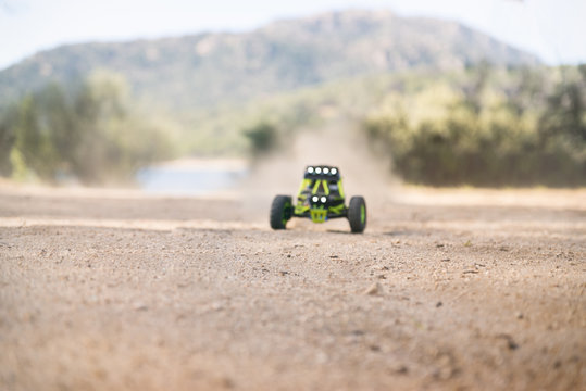 Radio-controlled car on the sand. In race.