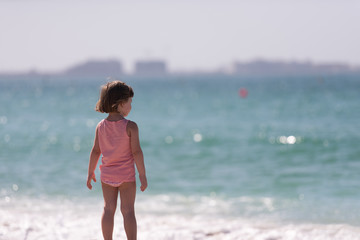 little cute girl at beach