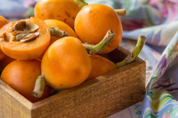 loquats on kitchen counter background.
