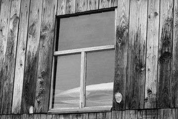 Old window on a wooden building