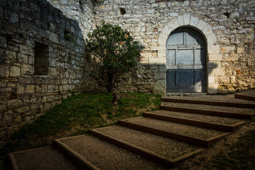 Fototapeta na wymiar The walls of the old castle in Brescia