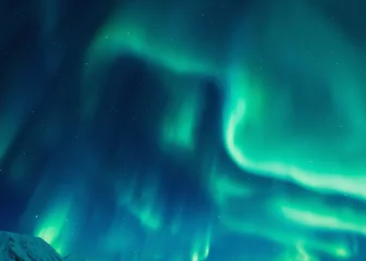 Fotobehang The polar Northern aurora borealis lights in Norway Svalbard in the mountains © bublik_polina