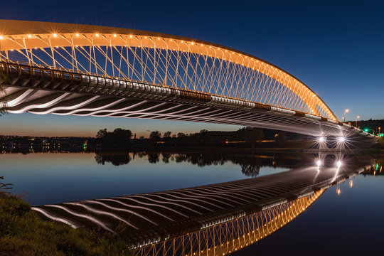 Fototapeta Troja bridge Prague over the Vltava river in the night with illumination. Trojsky most . Czech Republic