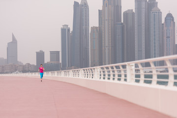 woman running on the promenade