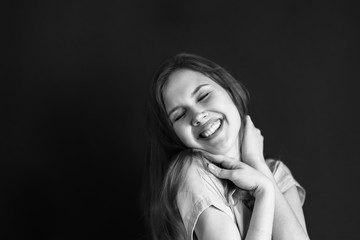 Naklejka premium Girl portrait laughing BW