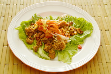 crispy fried chop catfish with green mango dressing sweet and sour sauce salad