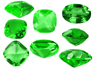 set of eight green emeralds gems on white