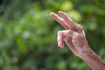 Hands of the old woman.