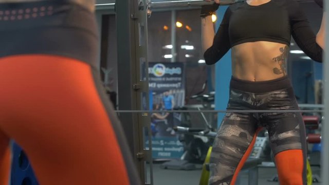 Blonde swinging in the gym