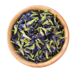 Dried pea flower in wood bowl on white background