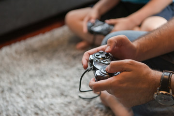 Happy family playing a video game © .shock