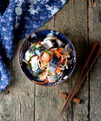 Marinated mackerel with onion and carrots in vinegar and olive oil. Korean food.
