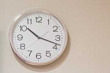silver and white steel clock on wall concept : late morning, sleeping, morning