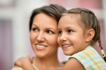 Little daughter with her mother