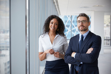 Portrait Of New Business Owners In Empty Office