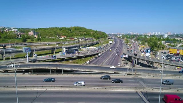 Aerial footage. Rise over road junction in city
