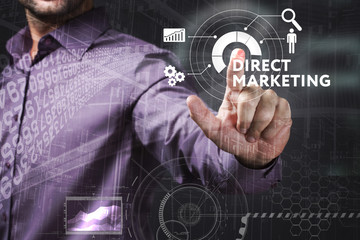 Business, Technology, Internet and network concept. Young businessman working on a virtual screen of the future and sees the inscription: Direct marketing