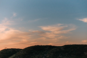 The sun sinks to the ground. Beautiful fiery sunset.
