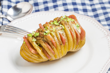 Baked potato with cheese and butter