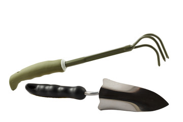 Small hand garden rake and trowel on white isolated background