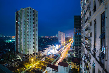 Aerial view skyline, building, and under construction sky train/metro project at blue hour in Tu Liem district, Hanoi. The first metro line opening in 2018, expected to transport 200K passengers daily © trongnguyen